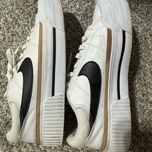 Nike Women’s White and Black Sneakers